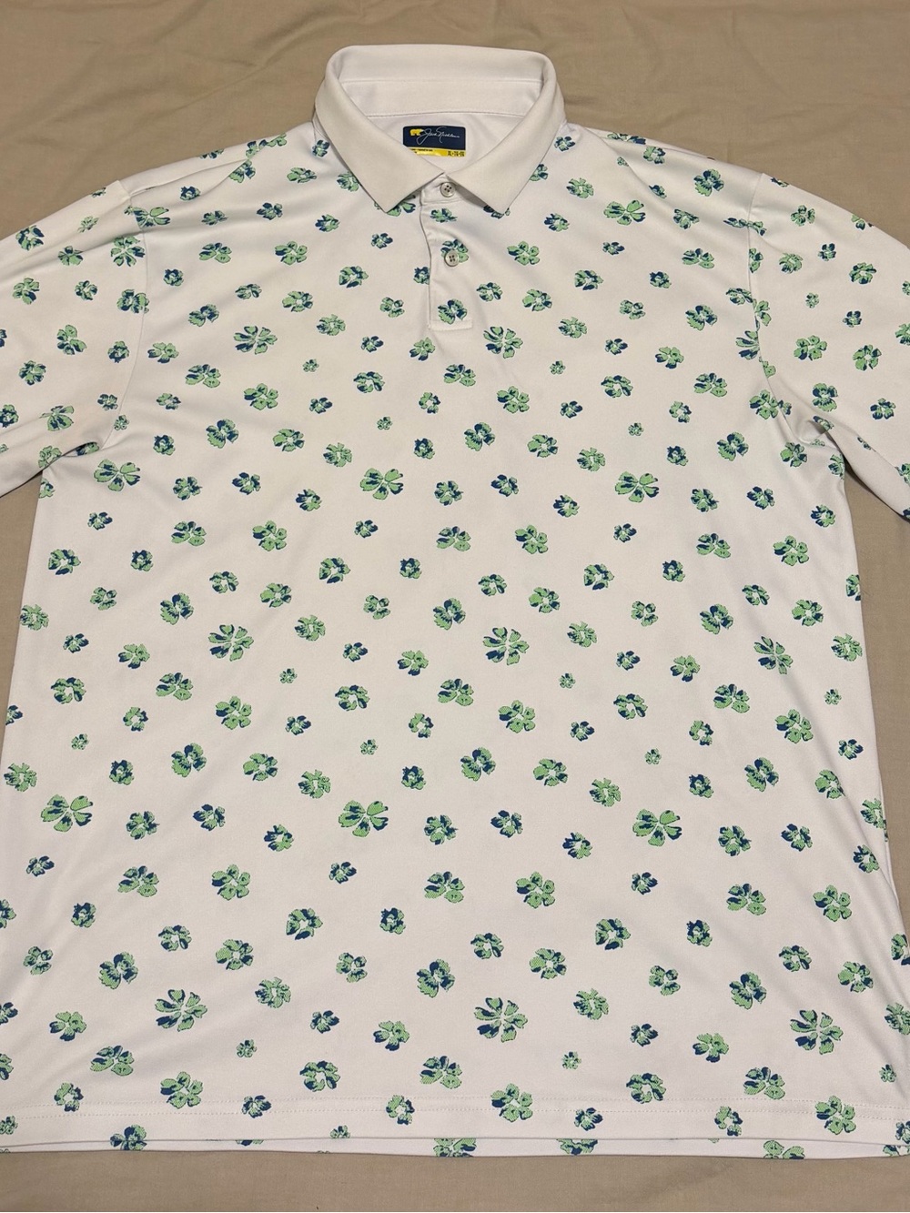 Jack Nicklaus Men’s Short-Sleeve White Polo with Four Leaf Clover Print